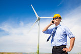 professional business standing with wind generator 