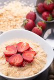 Oatmeal breakfast with strawberries