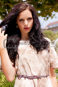 beautiful brunette woman fashion outdoor in summer
