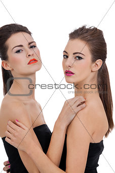 two beautiful girls with colorfull makeup isolated