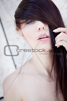beautiful woman portrait wirth long straight dark brown hair 