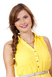 smiling young brunette woman in yellow dress isolated