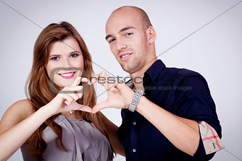 young attractive couple in love embracing portrait