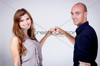 young attractive couple in love embracing portrait