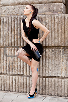 attractive brunette young woman in summer outdoor 