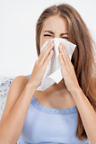 young brunette woman with flu cold influenza 