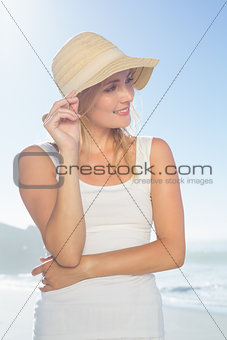 Gorgeous happy blonde posing at the beach