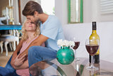 Cute couple drinking red wine