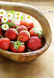 basket of fresh ripe strawberries - summer berries rustic style