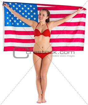 Pretty girl in bikini with american flag