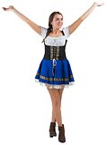 Pretty oktoberfest girl smiling with arms raised