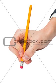 Hand using eraser on pencil