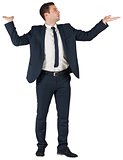 Businessman standing with arms out