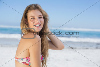 Beautiful happy blonde on the beach