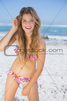 Beautiful happy blonde on the beach