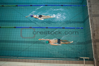 Man and woman swimming in the pool