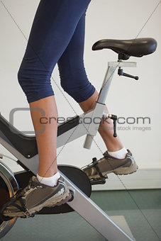 Fit woman on the spin bike