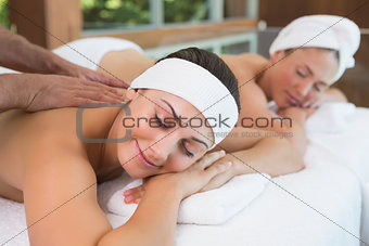 Pretty friends getting massages together