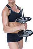 Female strong bodybuilder holding large black dumbbell