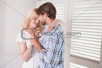 Romantic young couple dancing together