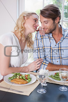 Young couple enjoying a meal together