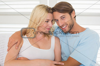 Young couple sitting on the couch