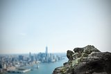 Large rock overlooking coastline city