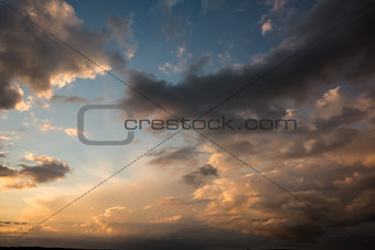 Blue and orange sky with clouds