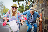 Hip young couple on a bike ride