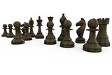 Black wooden chess pieces standing