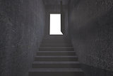 Grey staircase leading to open door