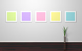 Empty colorful frames on wall