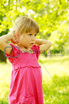 beautiful little girl on nature 