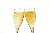 cheers, two champagne glasses with gold bubbles 