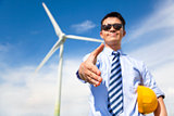 business man handshake cooperate to do wind power fuel