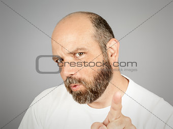 bearded man pointing