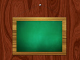 Green chalkboard hang on wooden wall