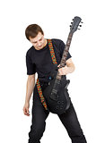 Young man with electric guitar isolated on white background. Per