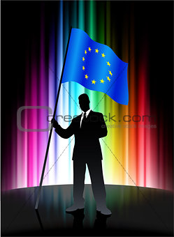 European Union Flag with Businessman on Abstract Spectrum Backgr