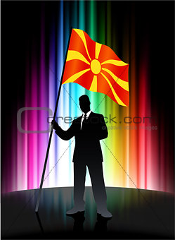 Macedonia Flag with Businessman on Abstract Spectrum Background