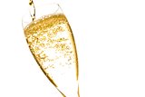champagne flute with golden fine bubbles