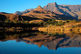 Sandstone mountains and reflection