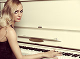 elegant girl near piano