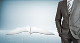 Businessman with open book