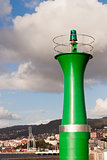 Green beacon in Vigo port.