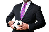 Business man with soccer ball