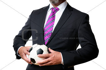 Business man with soccer ball