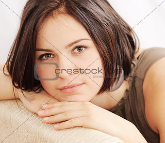 Portrait of a girl in studio on white background