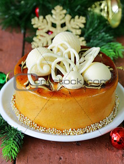 festive Christmas cake caramel biscuit  decorated with white chocolate