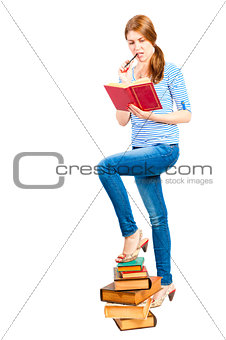 girl student reads the book carefully